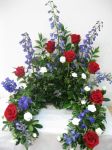 Roses and Blue Delphinum Urn Spray